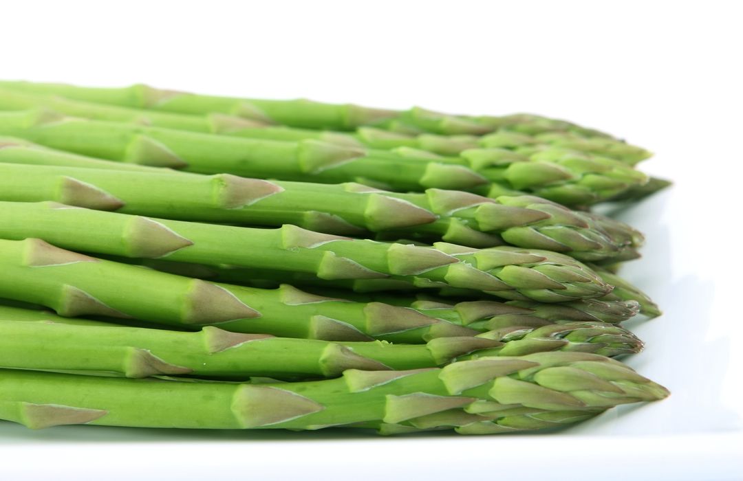 Fresh Green Asparagus Spears on White Background - Free Images, Stock Photos and Pictures on Pikwizard.com