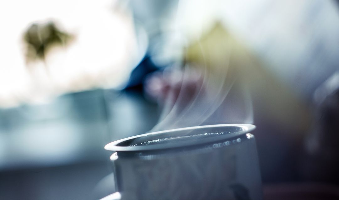 Steaming Coffee Cup with Blurred Background in Morning Light - Free Images, Stock Photos and Pictures on Pikwizard.com