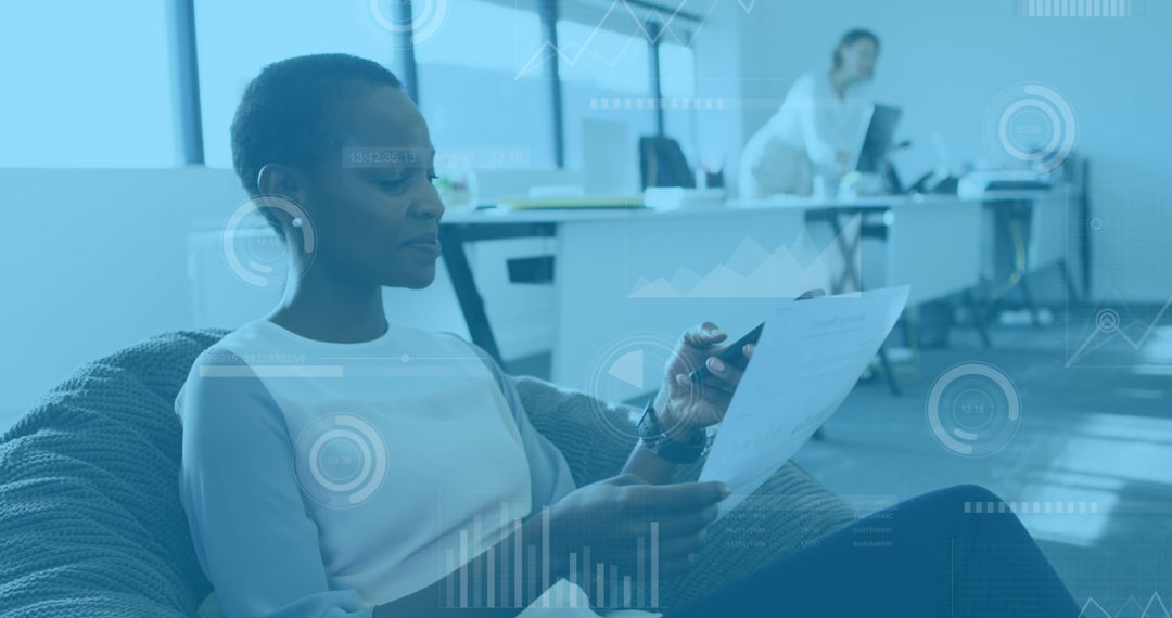 Businesswoman Analyzing Data and Discussing on Smartphone