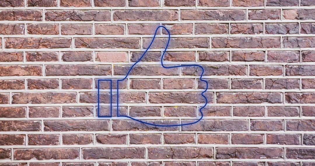 Neon Thumbs Up on Brick Wall Symbolizing Social Media Approval