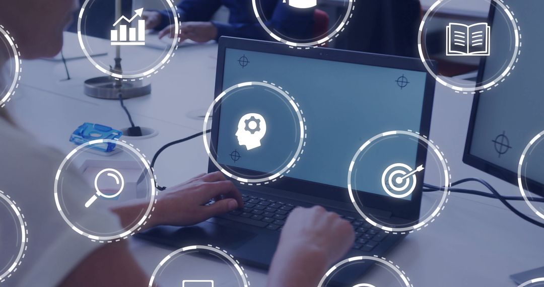 Business Professional Using Laptop with Digital Interface in Modern Office