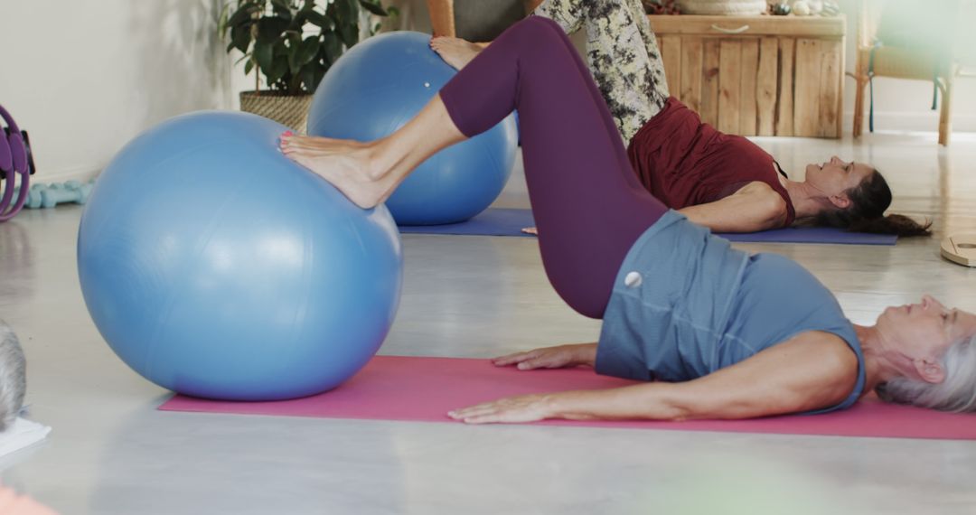 Senior Women Exercising with Pilates Ball in Home Gym - Free Images, Stock Photos and Pictures on Pikwizard.com