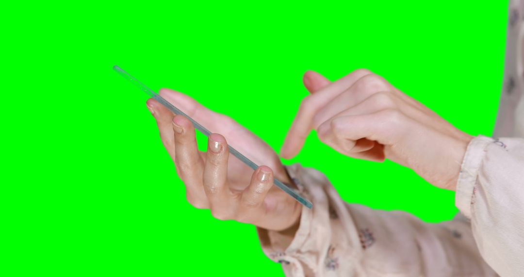 Close-Up of Woman Using Transparent Smartphone with Green Screen Background - Free Images, Stock Photos and Pictures on Pikwizard.com