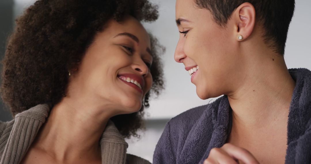 Two Smiling Women Enjoying Close Moments Together - Free Images, Stock Photos and Pictures on Pikwizard.com