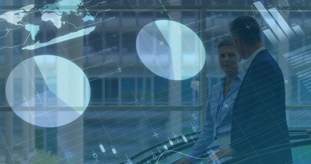 Business professionals discussing digital data technology in modern office