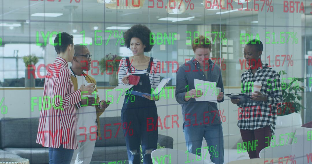 Diverse Business Team Analyzing Stock Market Trends in Modern Office