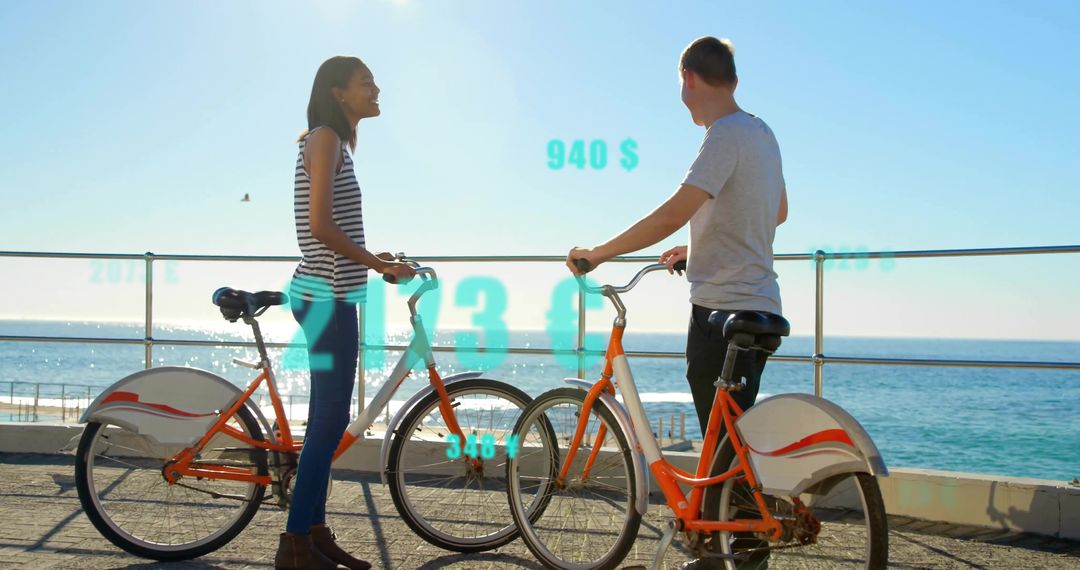 Couple Engaging with Augmented Reality Biking by the Beach