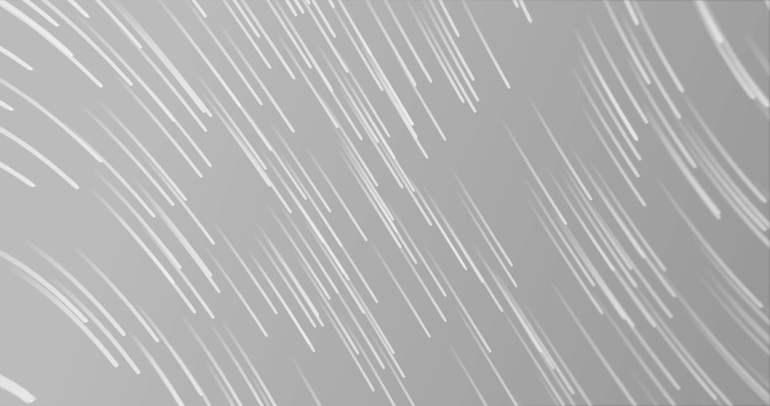 White Light Trails on Grey Background Creating Hypnotic Pattern
