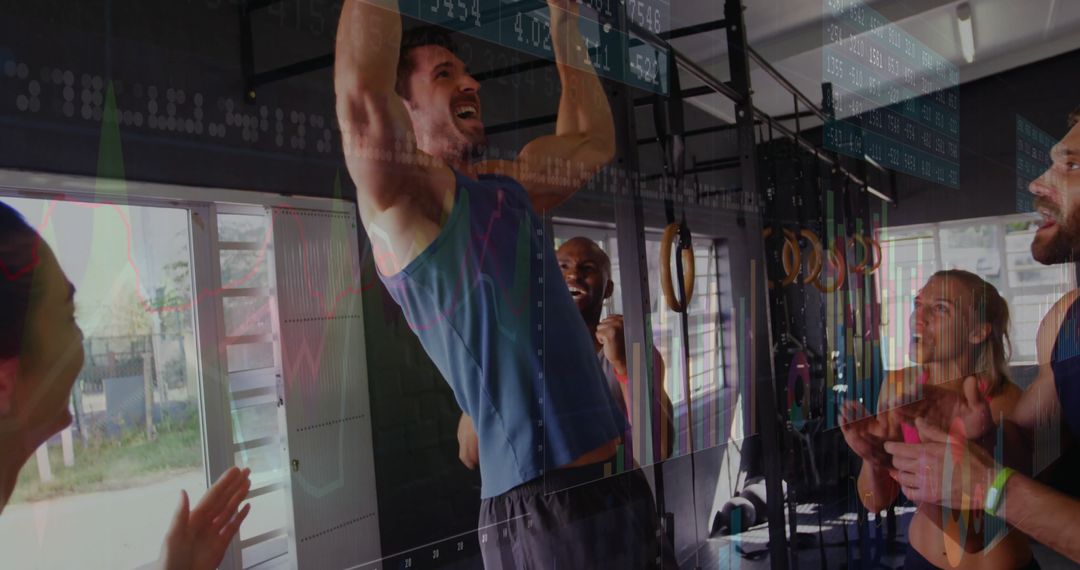 Strong Athletes Encouraging Pull-Up Performance in Gym Setting