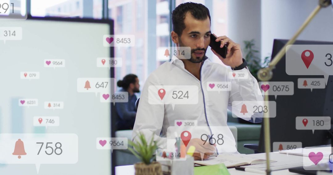 Focused Businessman Engaging with Digital Notifications in Office