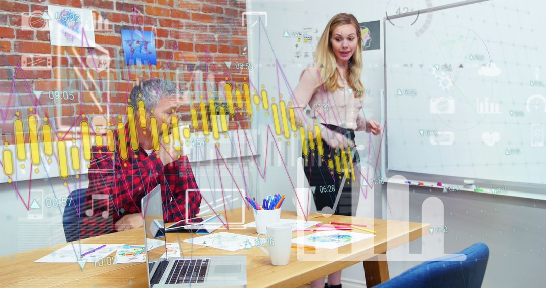 Creative Business Leaders Analyzing Financial Data with Technology Integration