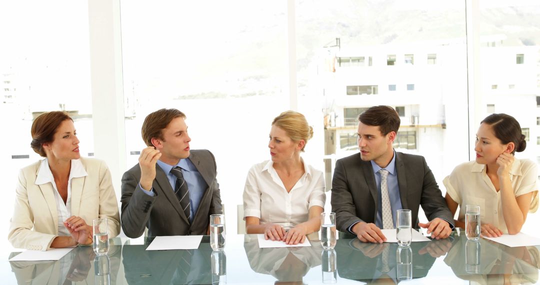 Business Team Having Discussion During Meeting in Modern Office - Free Images, Stock Photos and Pictures on Pikwizard.com