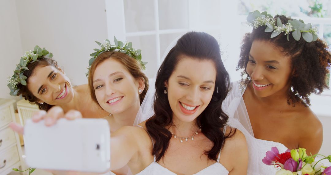 Multicultural Bride with Bridesmaids Smiling Together During Wedding - Free Images, Stock Photos and Pictures on Pikwizard.com