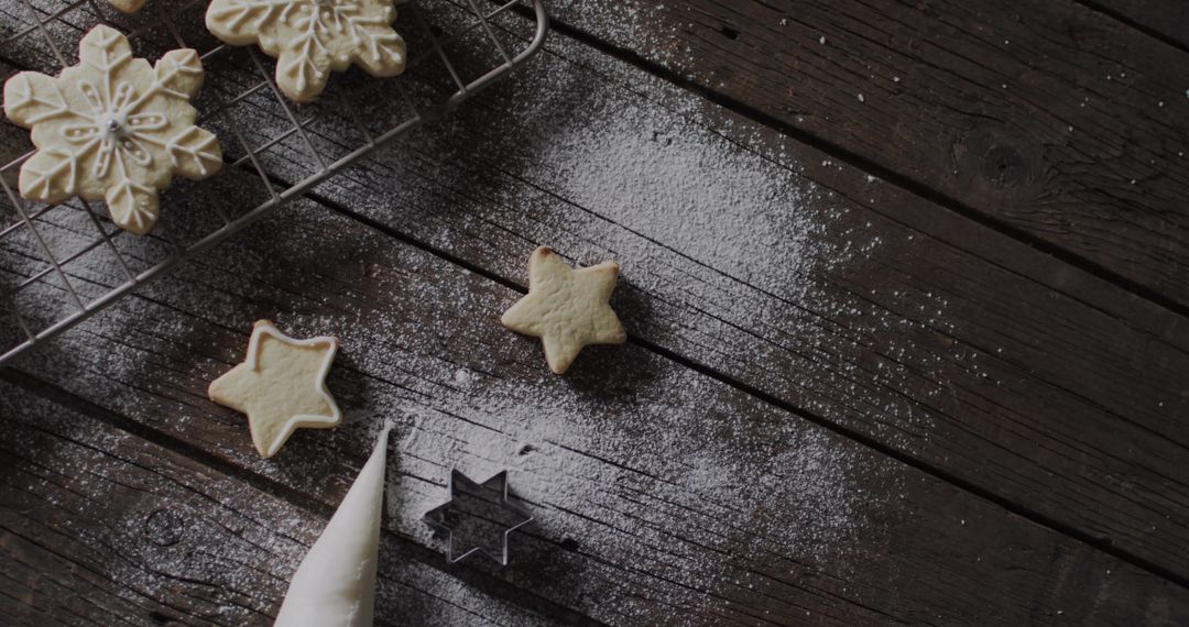 Festive Holiday Cookies with Confectioner's Sugar on Rustic Table