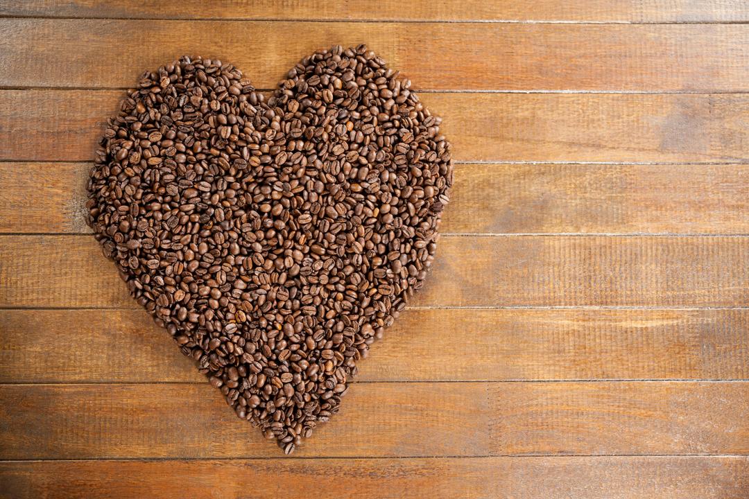 Heart Shaped Coffee Beans on Wooden Table - Free Images, Stock Photos and Pictures on Pikwizard.com
