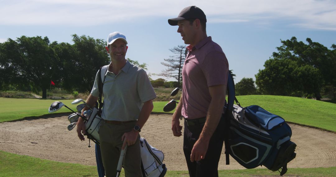 Two Men Enjoying Golf on Sunny Day - Free Images, Stock Photos and Pictures on Pikwizard.com