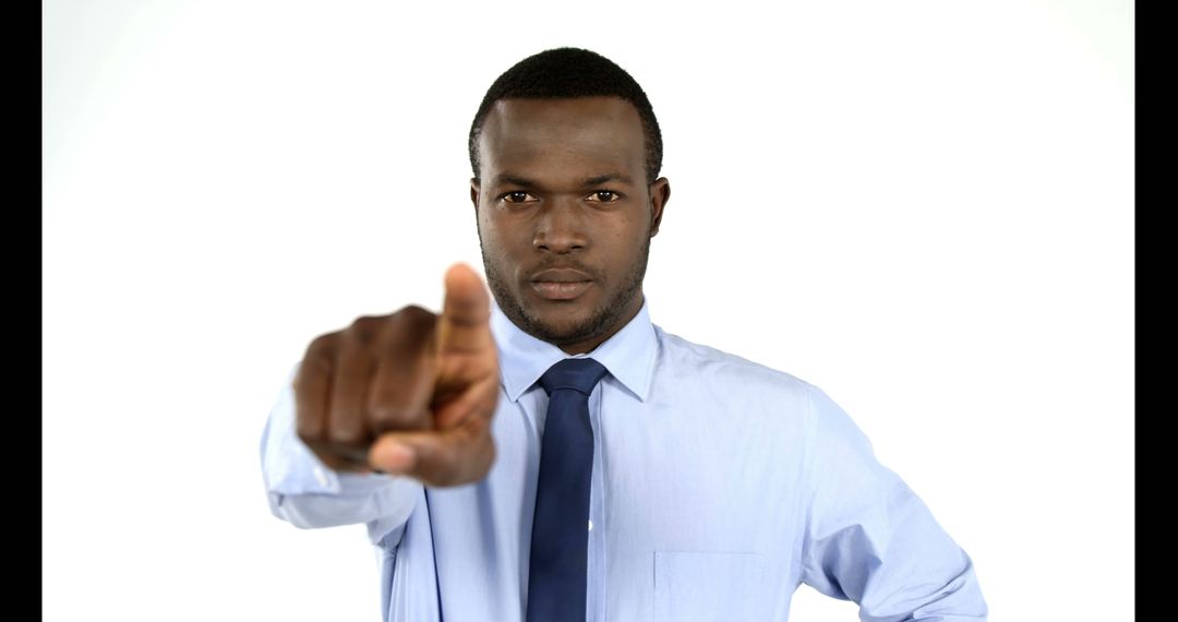 Confident African American Businessman Pointing at Camera - Free Images, Stock Photos and Pictures on Pikwizard.com