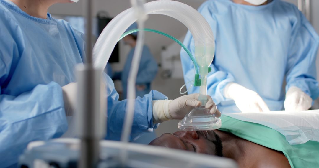 Doctors Administering Anesthesia to Patient in Operating Room - Free Images, Stock Photos and Pictures on Pikwizard.com