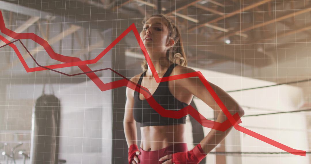 Fit Boxer Standing in Gym with Decreasing Graph Overlay