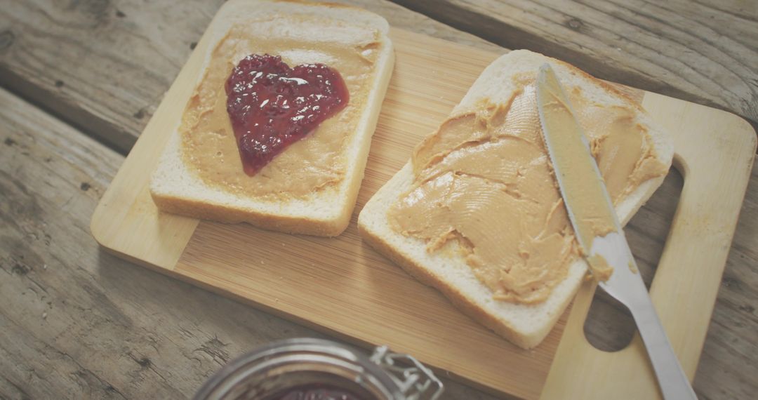 Featuring Heart-Shaped Jam on Peanut Butter Toast on Bamboo Board Rustic Cozy Breakfast Scene