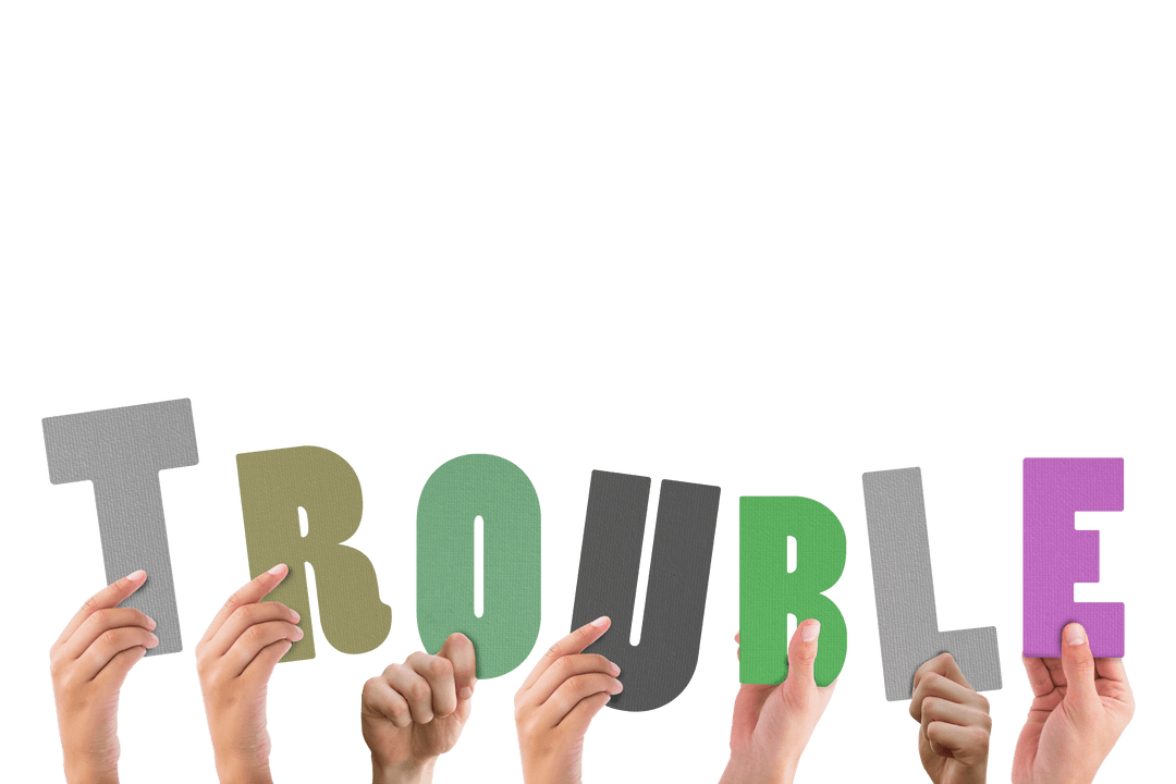 Hands Holding Transparent Colorful Letters Forming Trouble