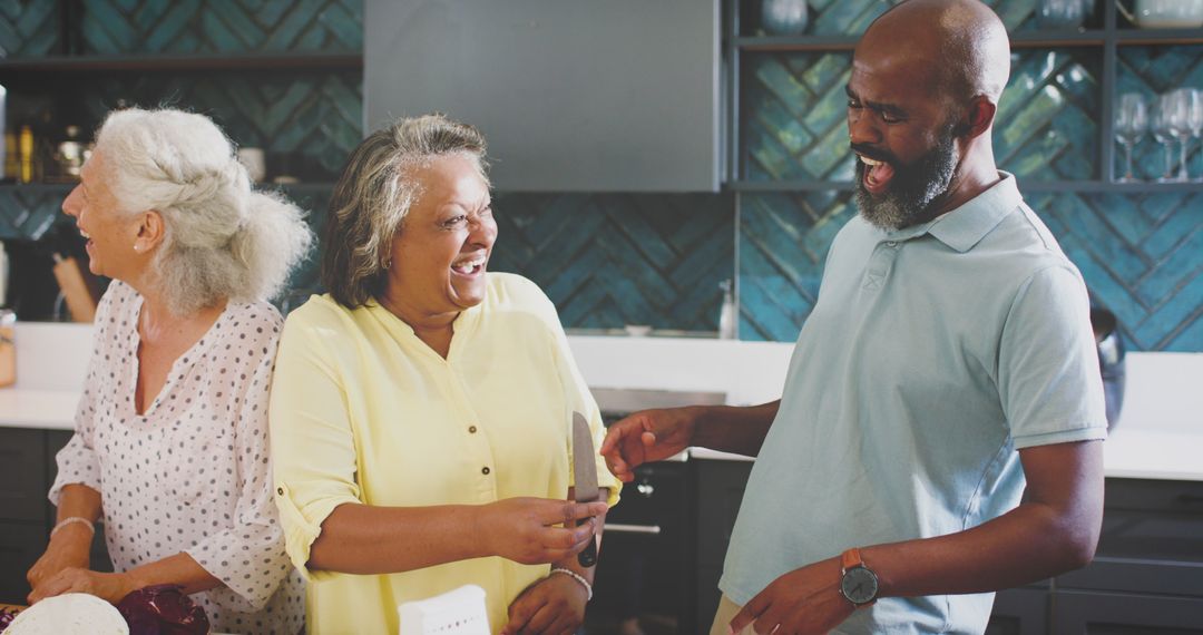 Diverse Friends Sharing Laughter in Modern Kitchen
