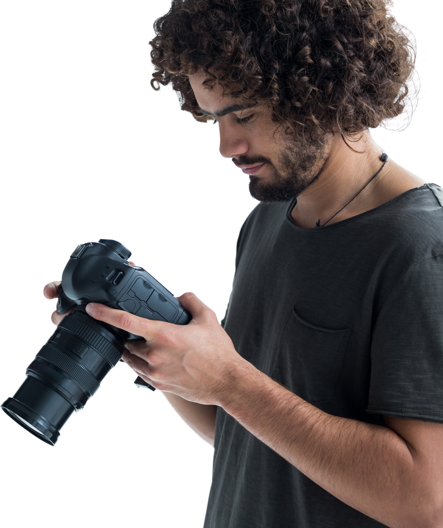 Young Curly-Haired Male Photographer Adjusting Digital Camera - Transparent Background - Download Free Stock Images Pikwizard.com