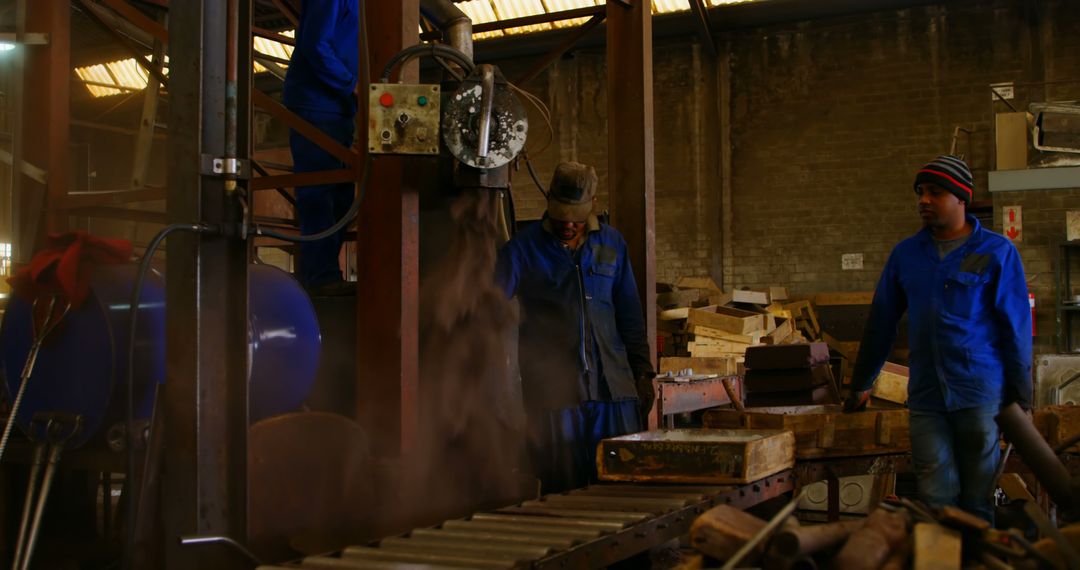 Industrial Worker Operating Machinery in Manufacturing Plant - Free Images, Stock Photos and Pictures on Pikwizard.com