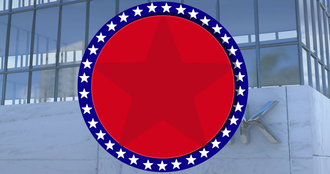 Circular Red Emblem with Stars on Office Building Background