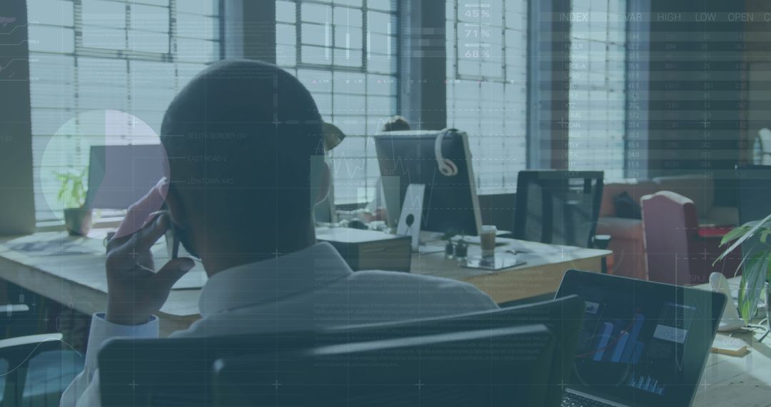 Businessman Discussing Strategy with Data Visualization Overlay