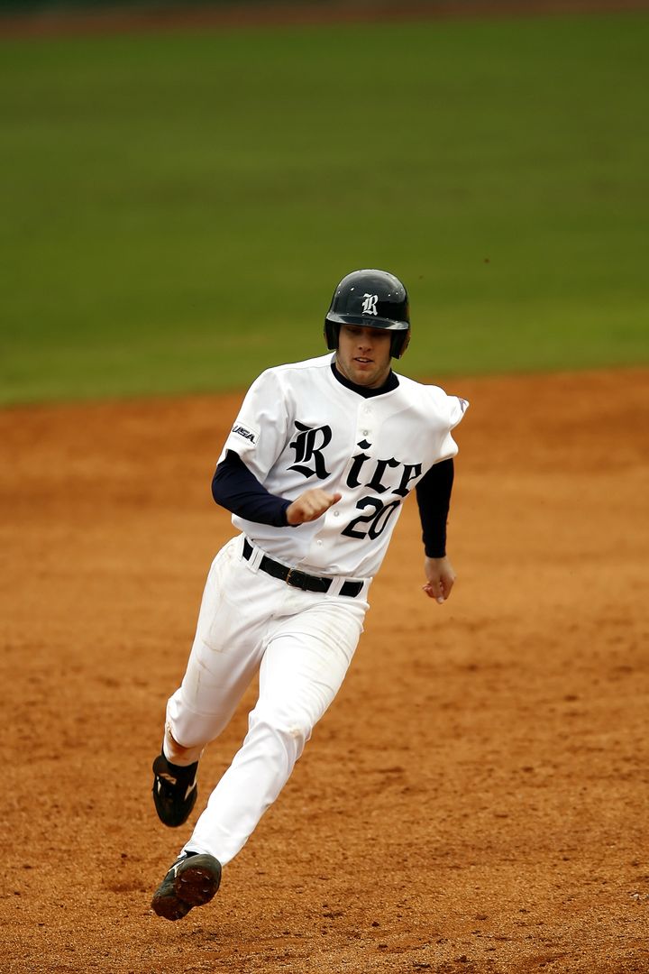 Baseball Player Running on Field with Determination - Free Images, Stock Photos and Pictures on Pikwizard.com