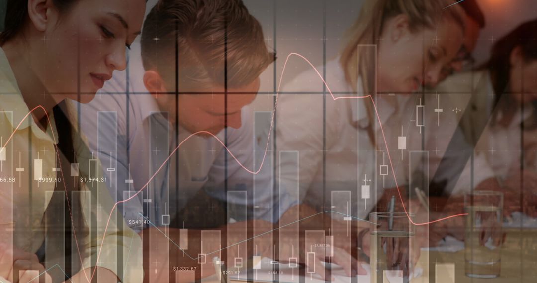 Business Team Analyzing Financial Data with Charts Overlay