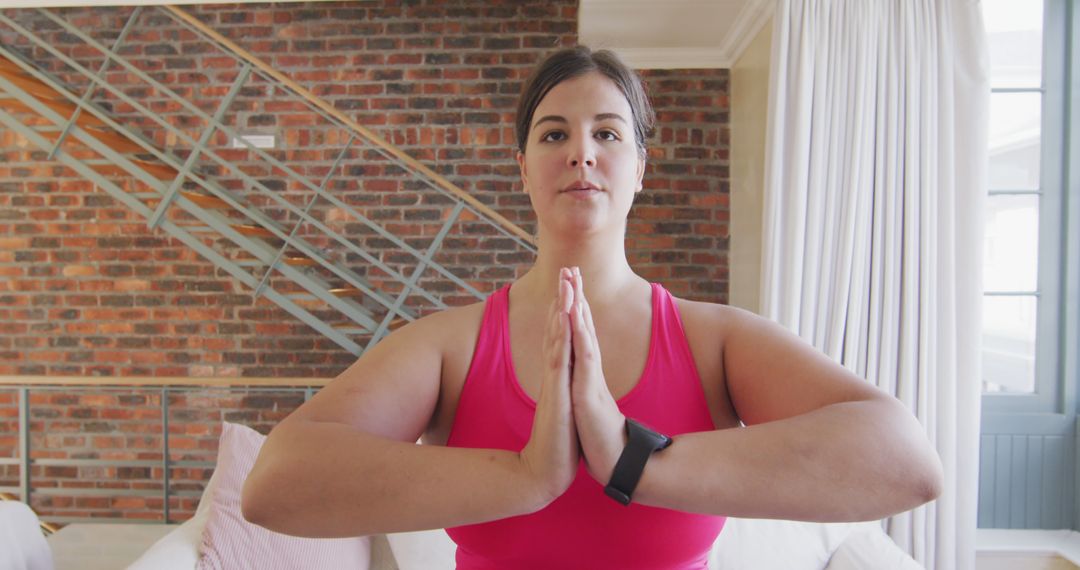 Woman Practicing Yoga with Hands in Prayer Position at Home - Free Images, Stock Photos and Pictures on Pikwizard.com