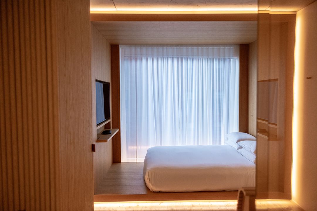 Minimalist modern bedroom with soft lighting design