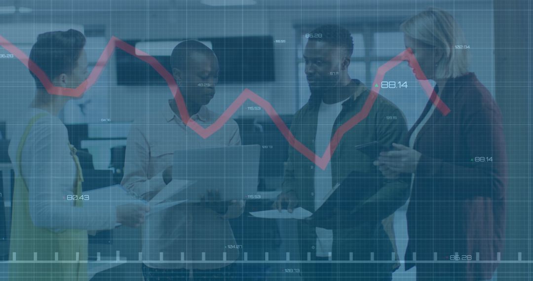 Diverse Business Team Reviewing Financial Data in Office