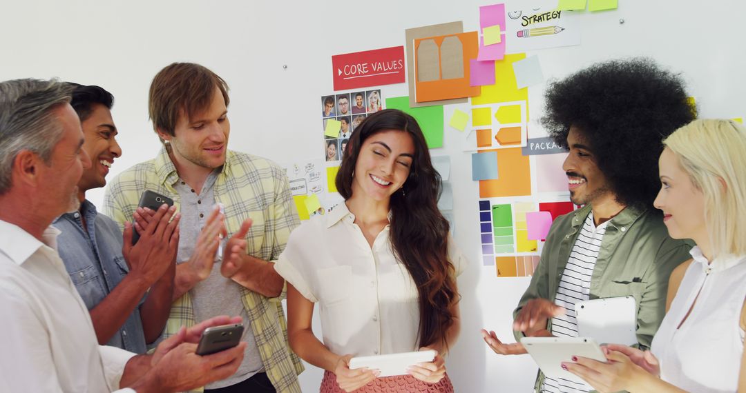 Diverse Team Collaborating for Creative Brainstorm in Modern Office