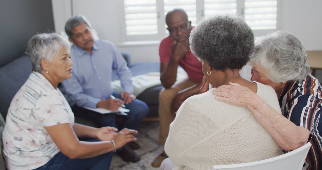 Support Group Sitting in Circle Comforting Elderly Member - Free Images, Stock Photos and Pictures on Pikwizard.com