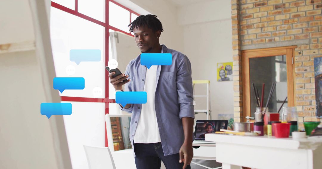 Artisan Receiving Digital Messages in Modern Studio