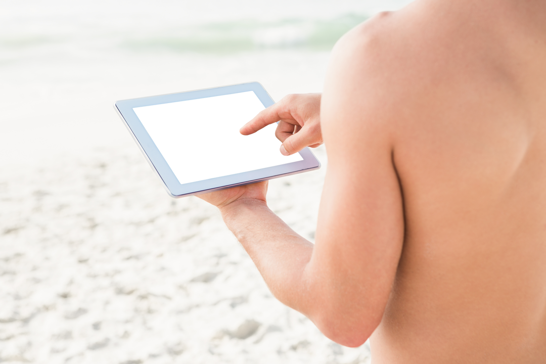 Transparent Screen Digital Tablet Being Used at Beach During Daytime - Download Free Stock Images Pikwizard.com