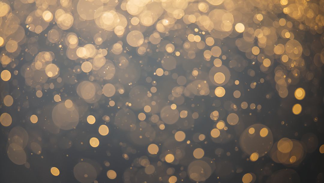Glowing Golden Bokeh with Soft Halos and Floating Particles for Festive Elegance