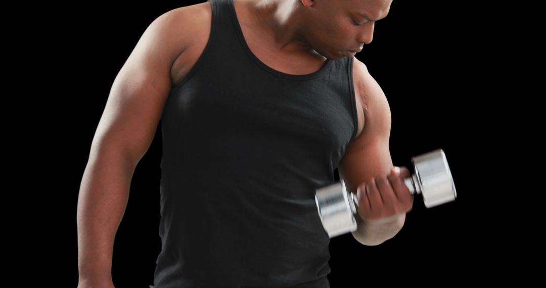 Man Lifting Dumbbell Wearing Black Tank Top - Free Images, Stock Photos and Pictures on Pikwizard.com