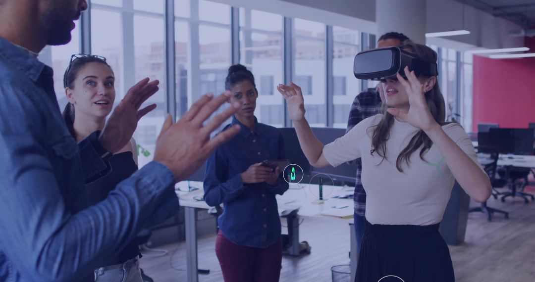 Team Collaborating in Open Office Wearing VR Headsets