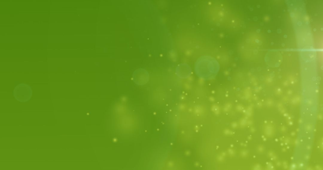 Glowing Yellow Particles on Vibrant Green Background