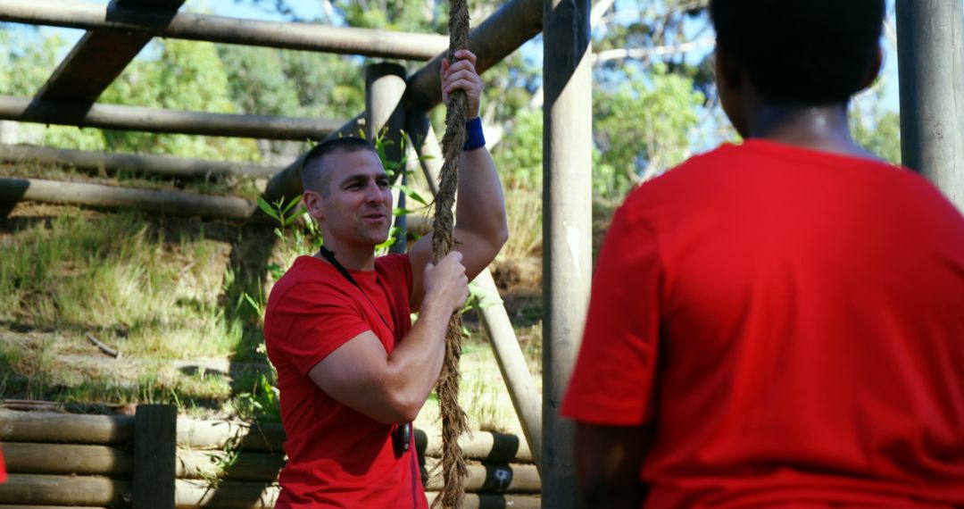 Group of Adults Participating in Outdoor Obstacle Course Training - Free Images, Stock Photos and Pictures on Pikwizard.com