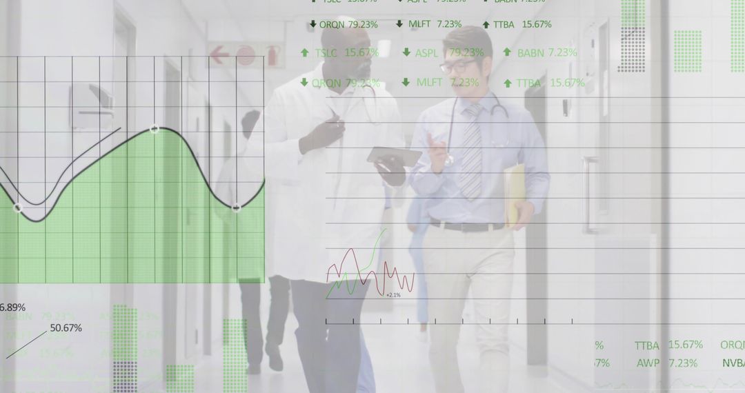 Medical Team Collaborating on Digital Data Integration in Hospital Corridor