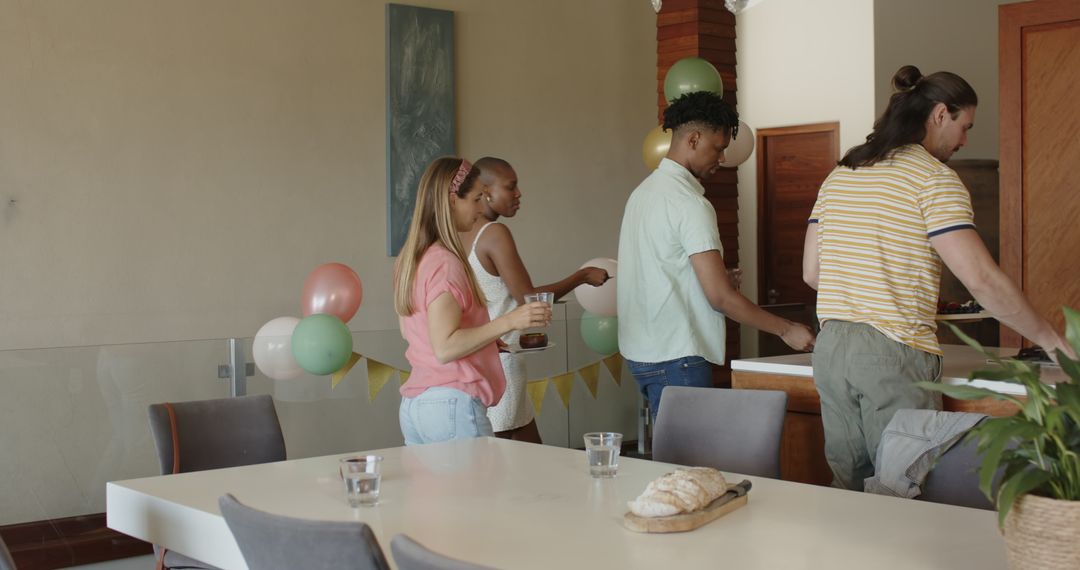 Friends Preparing Table for Meal in Casual Gathering
