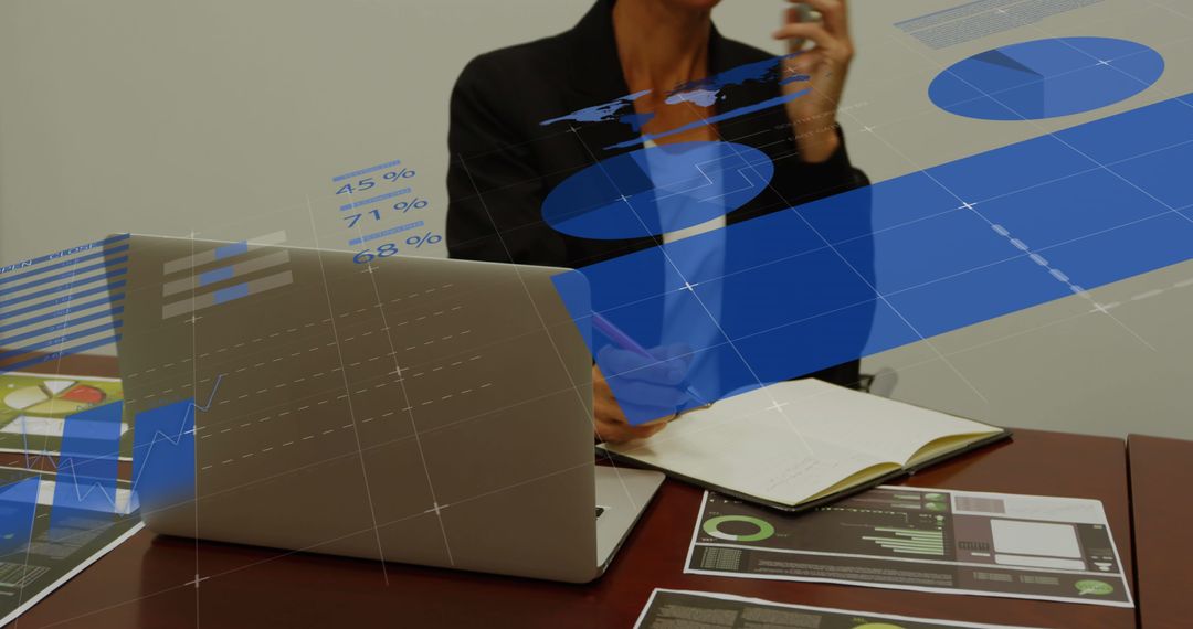 Business Professional Analyzing Data with Futuristic Holographic Charts in Office - Free Images, Stock Photos and Pictures on Pikwizard.com