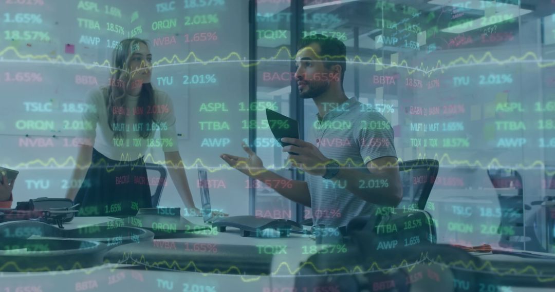 Two Professionals Analyzing Stock Market Data in Modern Office