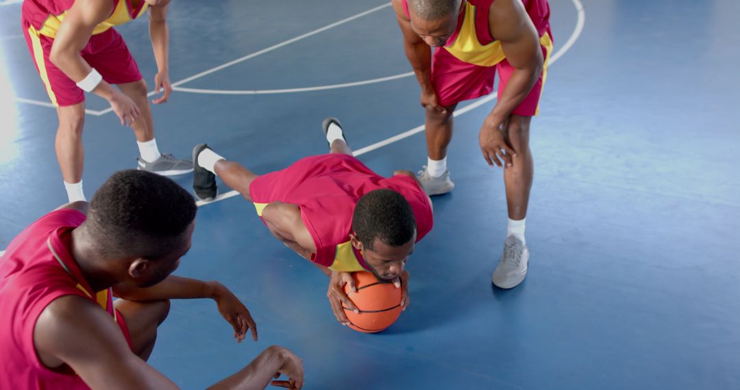 Basketball Team Discussing Tactics on Court in Slow Motion