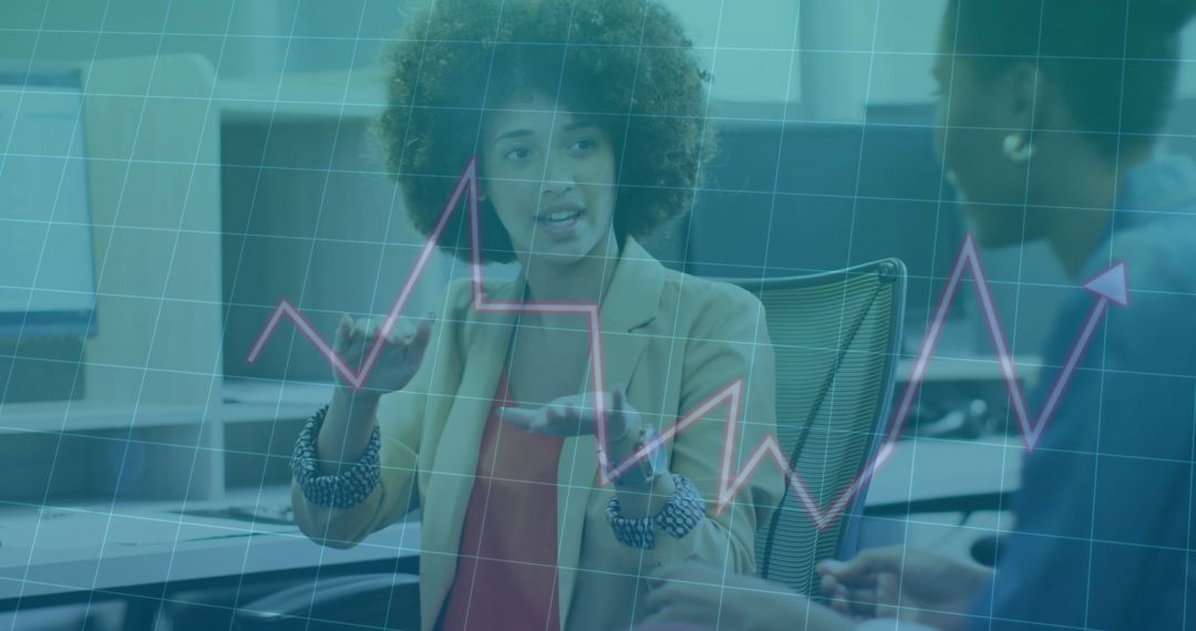 Business Professional Discussing Data Visualizations in Modern Office